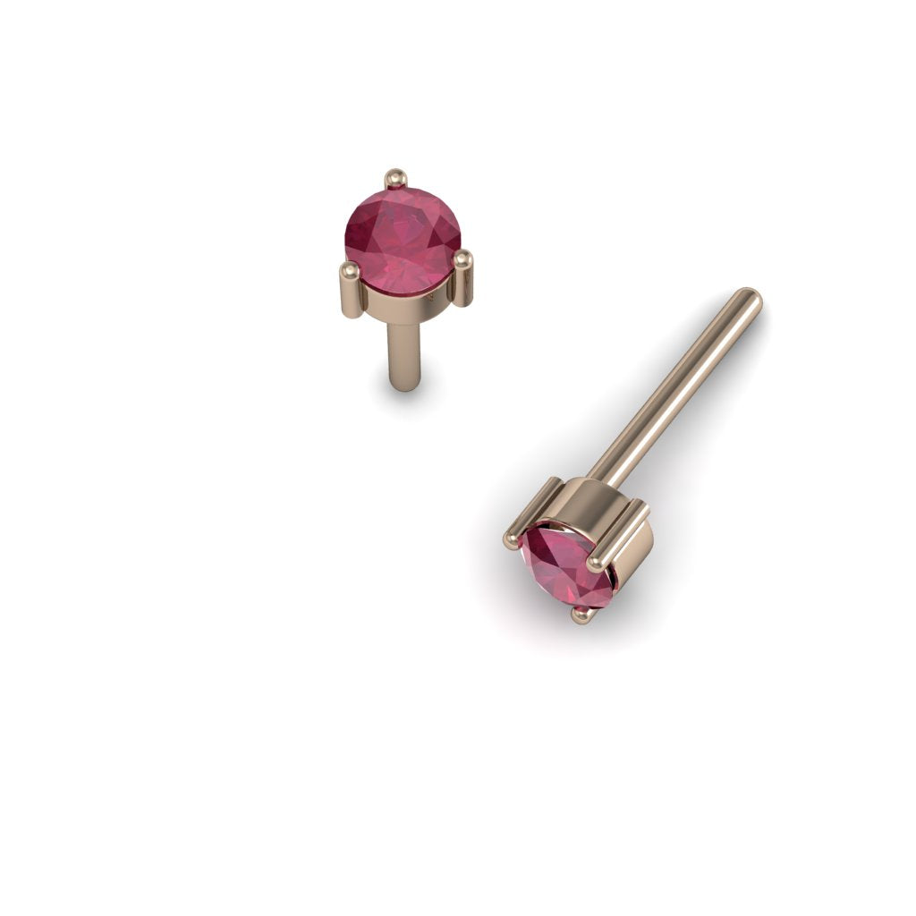 Aretes topos de oro rosado 18k con rubíes redondos talla fancy de 0.10ct, vista frontal. Joyería de autor, hecho en Colombia por Mariana Shuk.