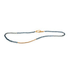 Collar secuencia una vuelta con cuentas de topacio london con hematita y miyuki. Broche en plata 925 con enchape de oro amarillo.