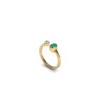 ANILLO BALANCE ESMERALDA OVALADA Y DIAMANTE REDONDO