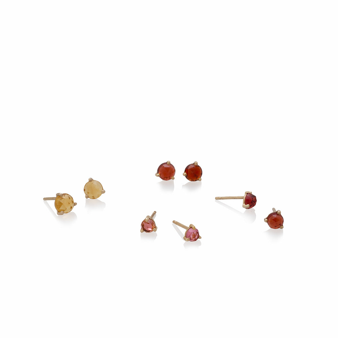 Aretes en oro amarillo de 18k con citrinos redondos de 6mm rose cut 