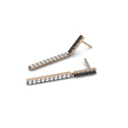 Aretes pendientes de oro rosado 18k con diamantes negros y salt-pepper, vista superior. Joyería de autor, hecho en Colombia por Mariana Shuk.