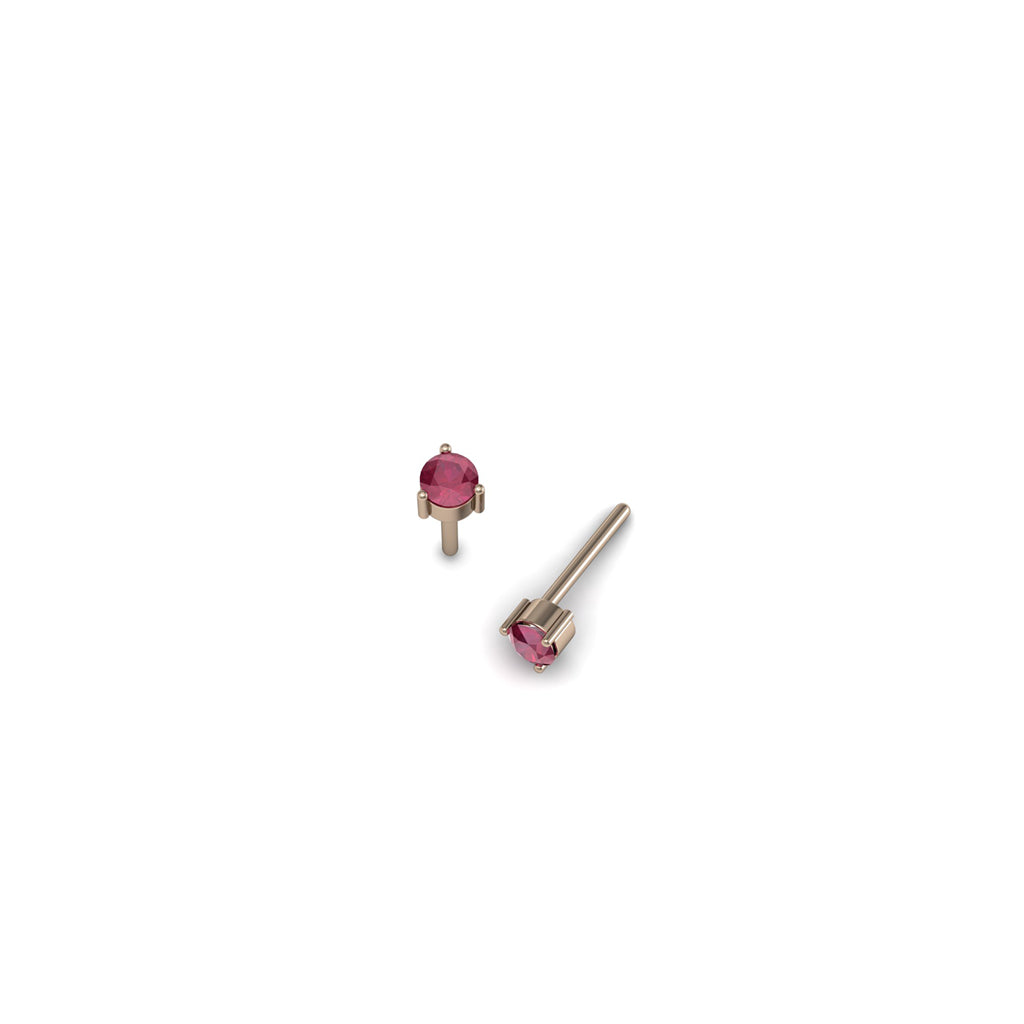 Aretes topos de oro rosado 18k con rubíes redondos de 0.10ct, vista lateral. Joyería de autor, hecho en Colombia por Mariana Shuk.