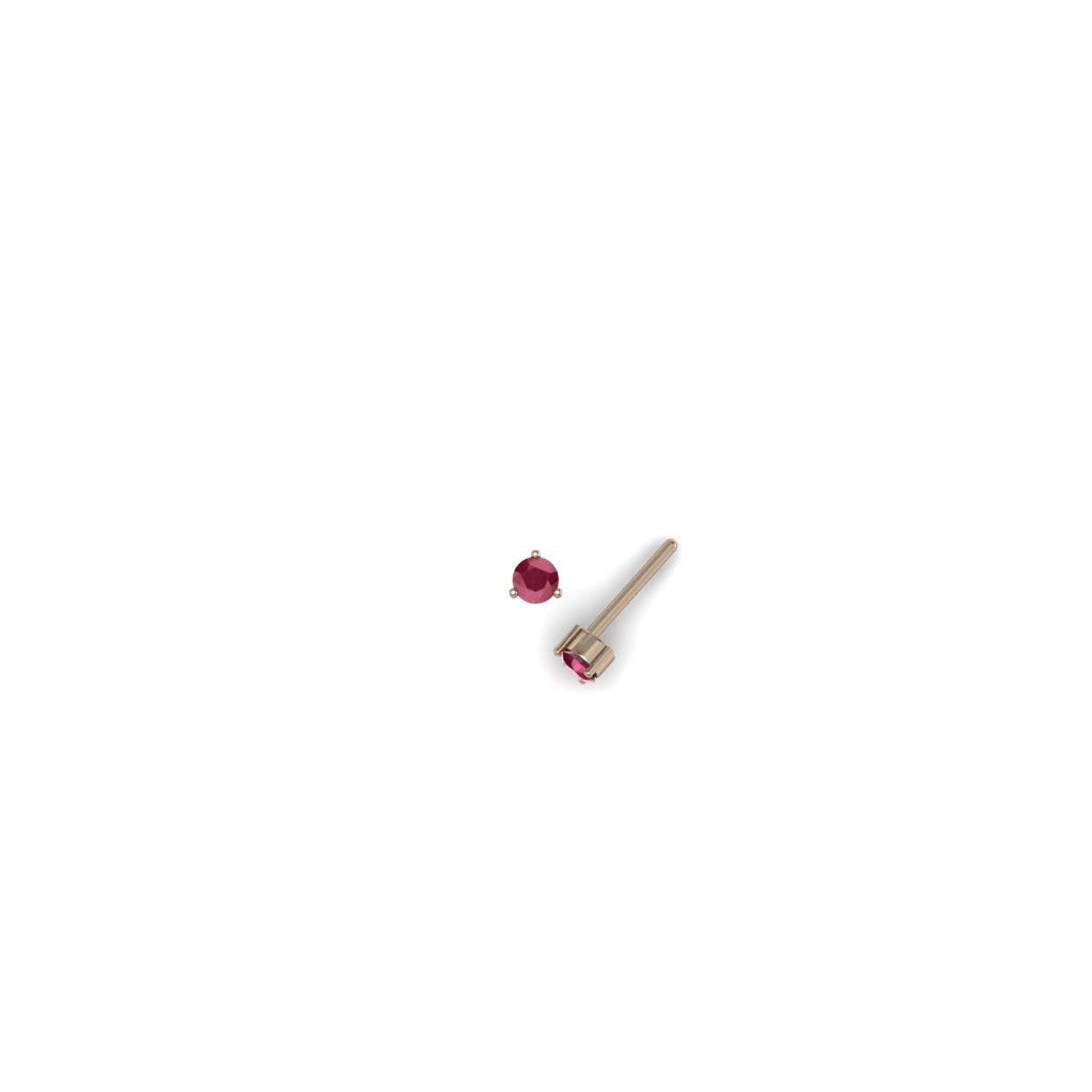 Aretes topos de oro rosado 18k con rubíes redondos de 0.10ct, vista lateral. Joyería de autor, hecho en Colombia por Mariana Shuk.