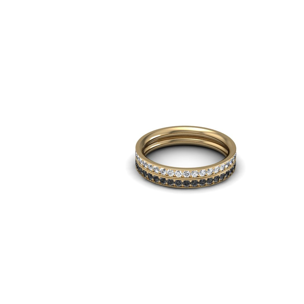 Dos argolla sin fin livianas en oro amarillo 18k con 36 diamantes negros y otra con diamantes blancos, joyería artesanal hecha a mano en Colombia. Vista una sobrepuesta a la otra.