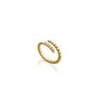 Anillo serpiente espiral en oro amarillo, de 18k con 6 diamantes, vista lateral, alta joyería hecha a mano en Colombia.