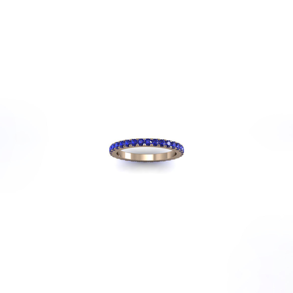 Argolla en oro rosado con 31 zafiros redondos de 1.8 mm, vista frontal, joyería de autor hecha a mano en Colombia.