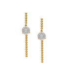 Pendientes largos en oro amarillo 18k con piedra luna azul vista frontal. Joyería de autor, hecho en Colombia por Mariana Shuk.