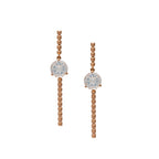 Pendientes largos con piedra luna azul en oro rosado 18k vista frontal. Joyería de autor, hecho en Colombia por Mariana Shuk.